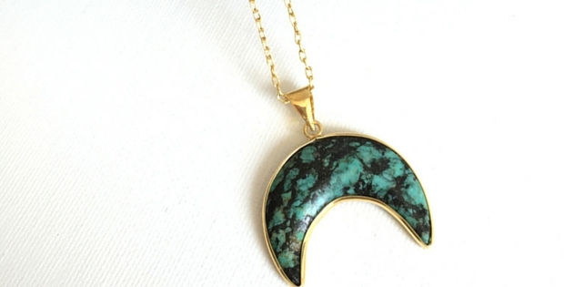 A Moon Necklace In Turquoise And Gold